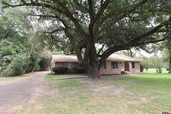 7.9 Acres of Land with Home for Sale in Pittsburg, Texas