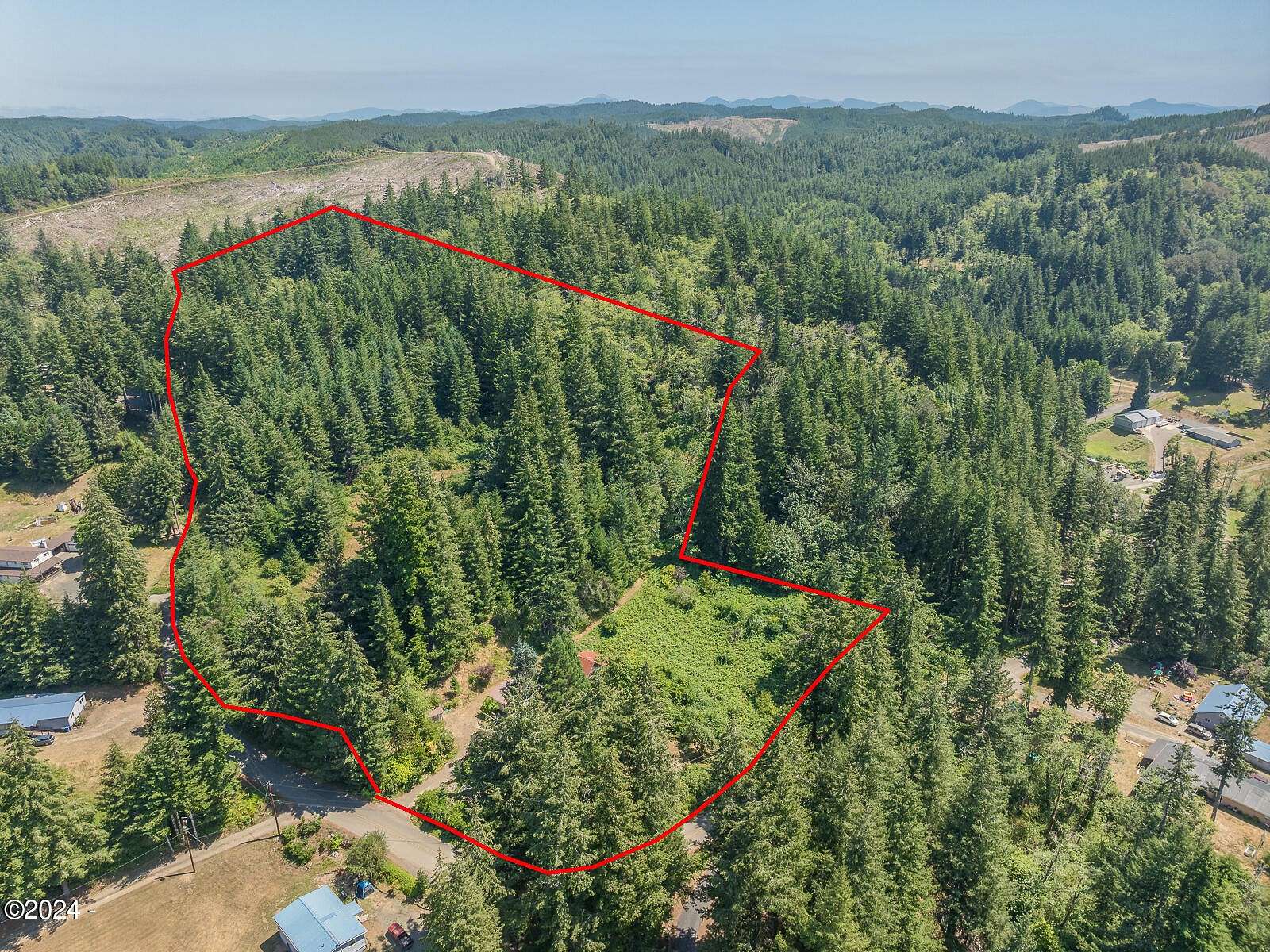 27.11 Acres of Land with Home for Sale in Toledo, Oregon