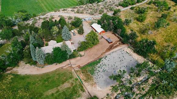 3.26 Acres of Residential Land with Home for Sale in Montrose, Colorado