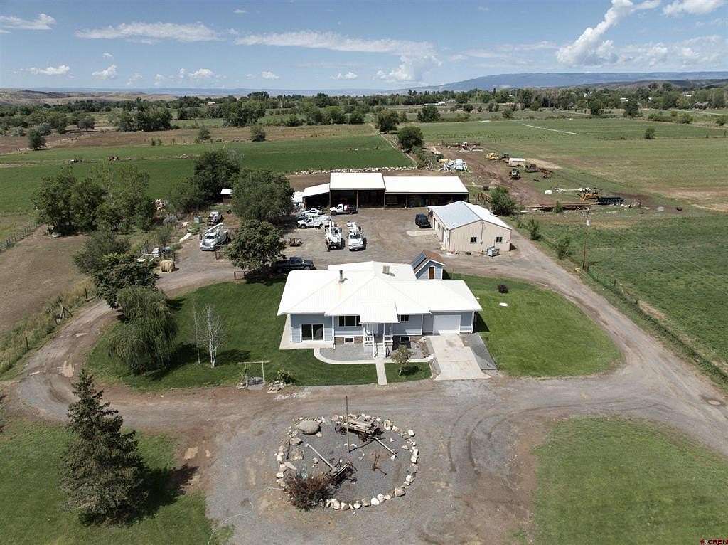 21.8 Acres of Agricultural Land with Home for Sale in Hotchkiss, Colorado