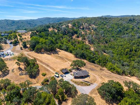 22.23 Acres of Agricultural Land with Home for Sale in Morgan Hill, California