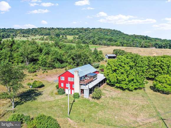 80 Acres of Agricultural Land with Home for Sale in Romney, West Virginia