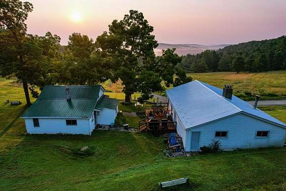 113.8 Acres of Recreational Land with Home for Sale in Nichols, New York