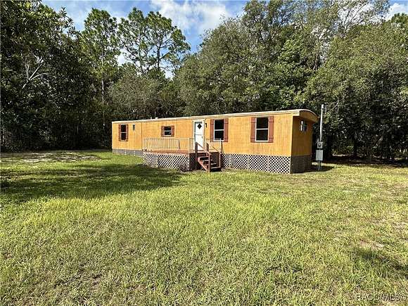 2.29 Acres of Residential Land with Home for Sale in Homosassa, Florida