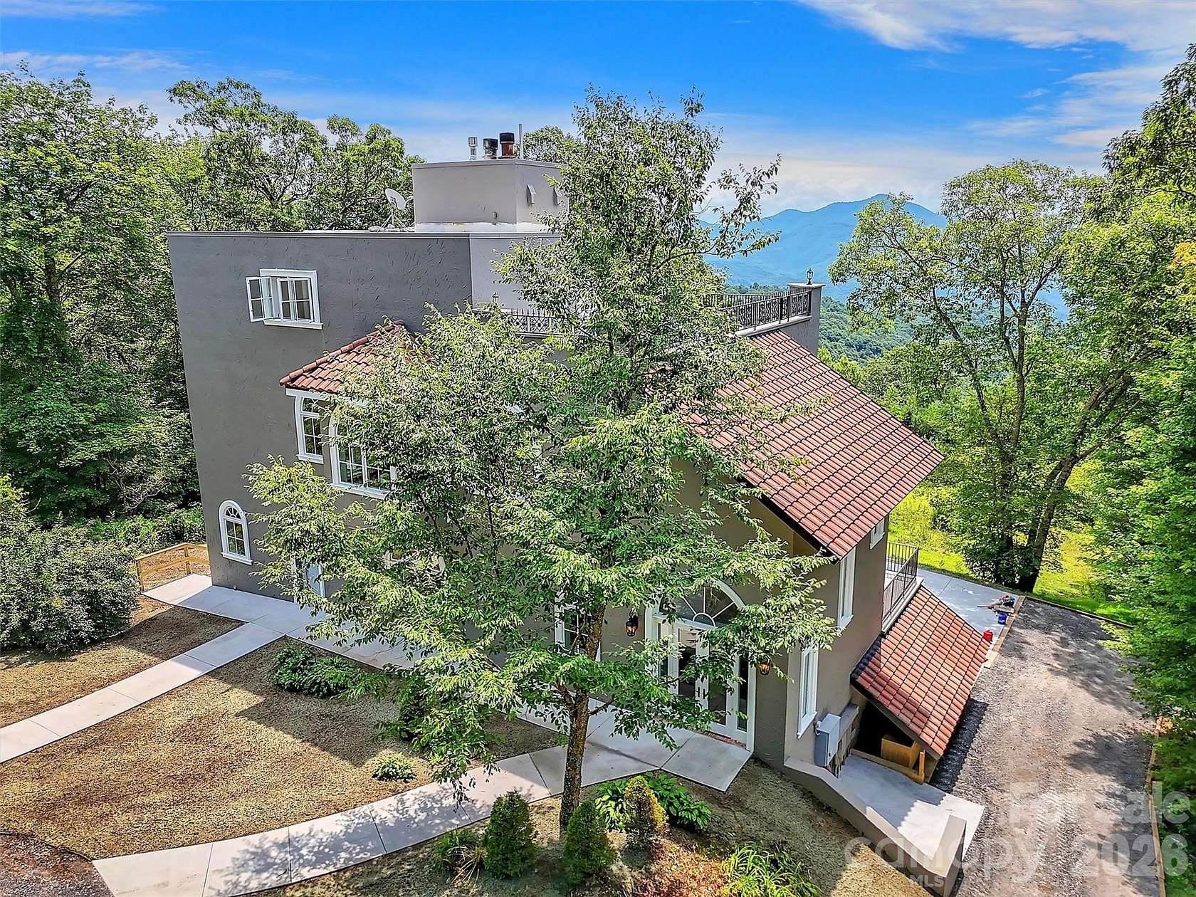 7 Acres of Land with Home for Sale in Sylva, North Carolina