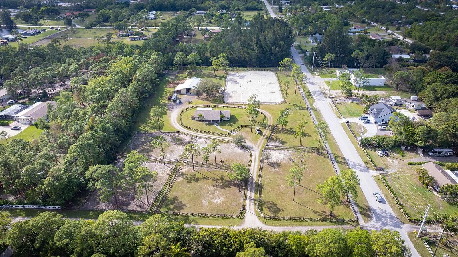 5.499 Acres of Land with Home for Sale in Loxahatchee Groves, Florida