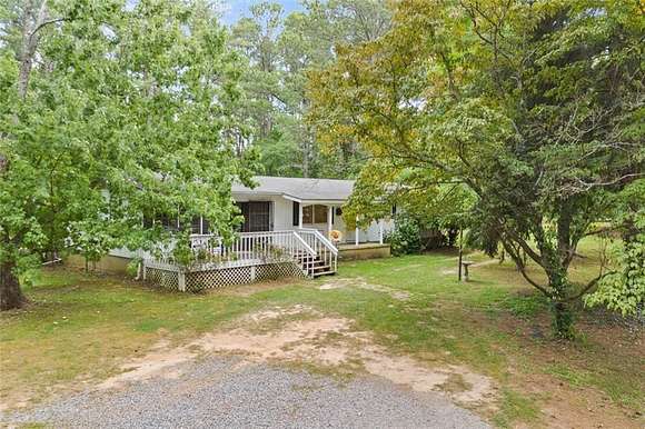 5.5 Acres of Residential Land with Home for Sale in Woodstock, Georgia