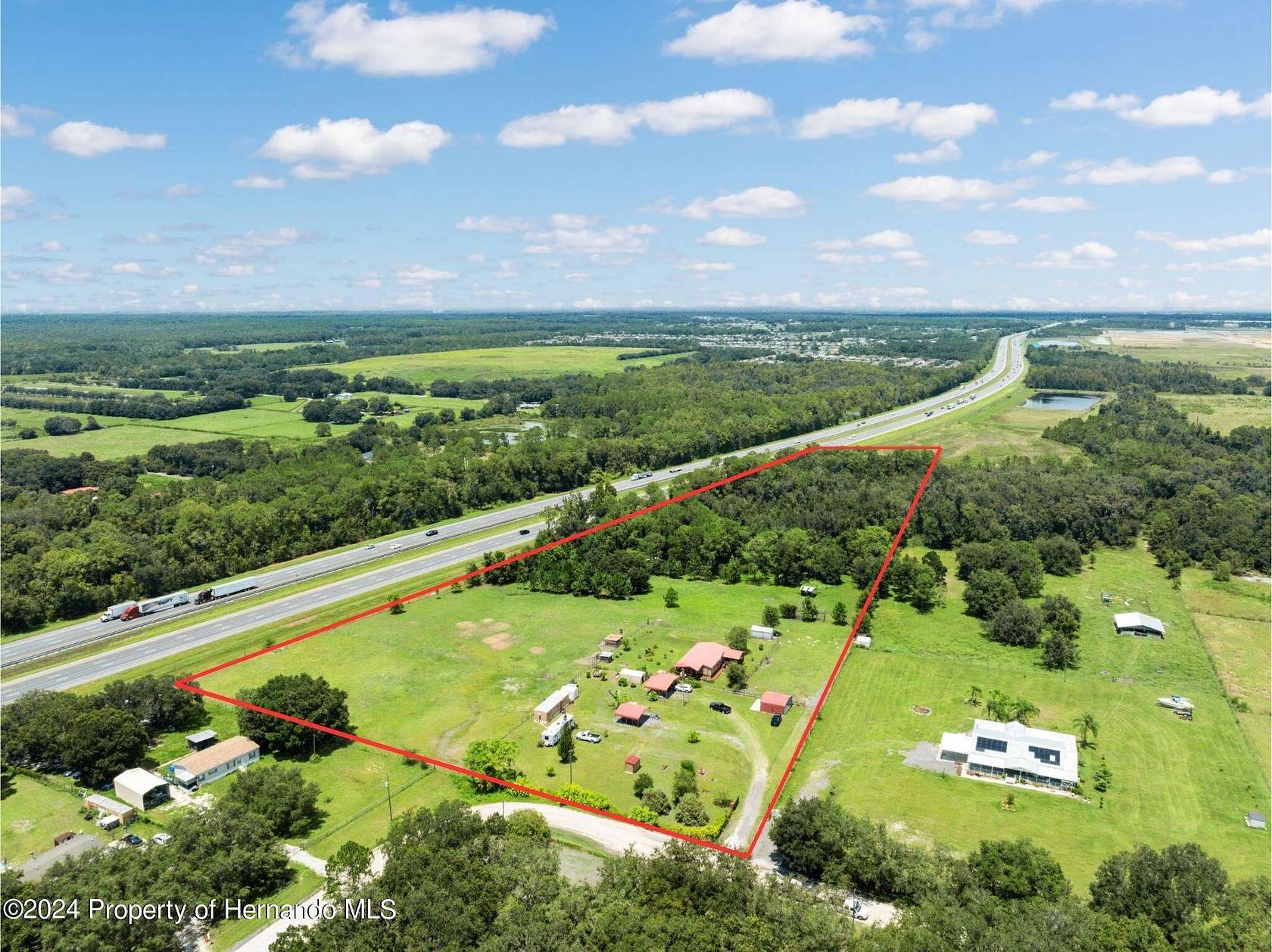 11.66 Acres of Improved Land for Sale in Wesley Chapel, Florida