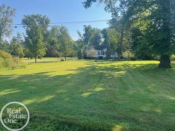 20 Acres of Land with Home for Sale in Ira Township, Michigan