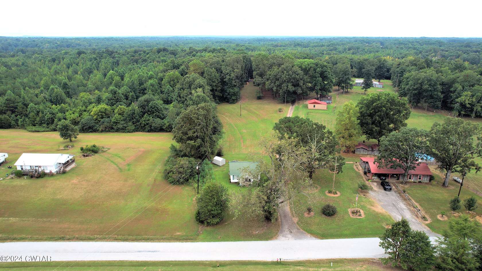 62 Acres of Agricultural Land with Home for Sale in Beech Bluff, Tennessee