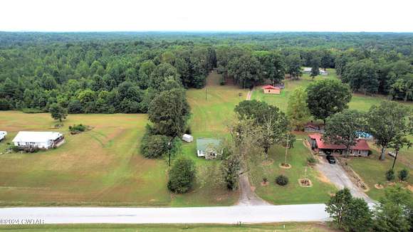 62 Acres of Agricultural Land with Home for Sale in Beech Bluff, Tennessee