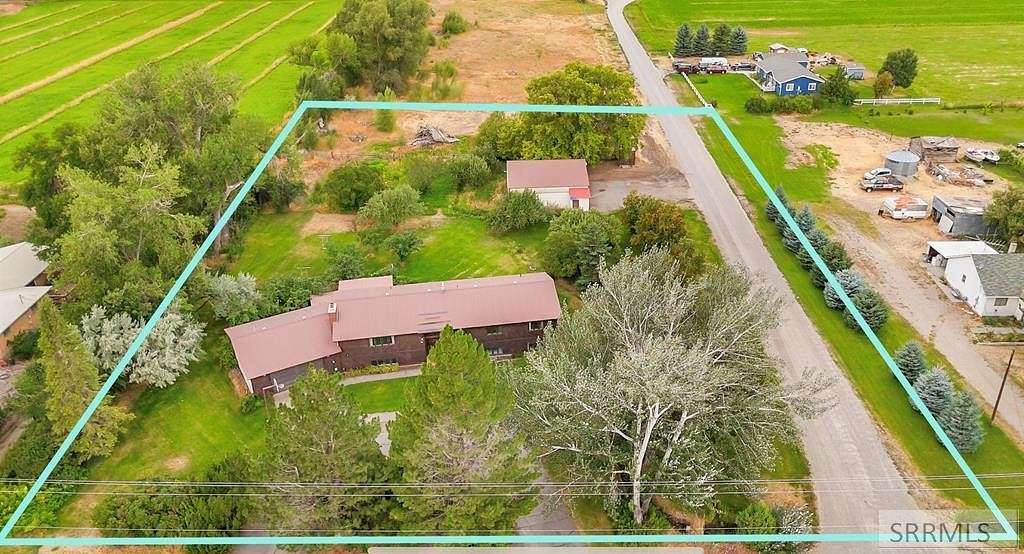 2.11 Acres of Residential Land with Home for Sale in Rigby, Idaho