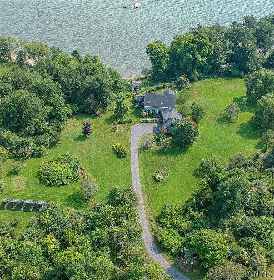 7.55 Acres of Land with Home for Sale in Three Mile Bay, New York