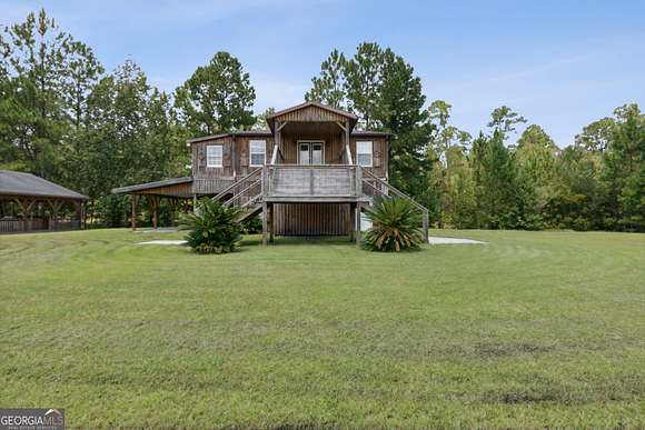 18.06 Acres of Land with Home for Sale in Waverly, Georgia