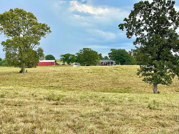 238 Acres of Land with Home for Sale in El Dorado Springs, Missouri