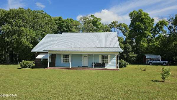 36.7 Acres of Land with Home for Sale in Greenwood, Florida