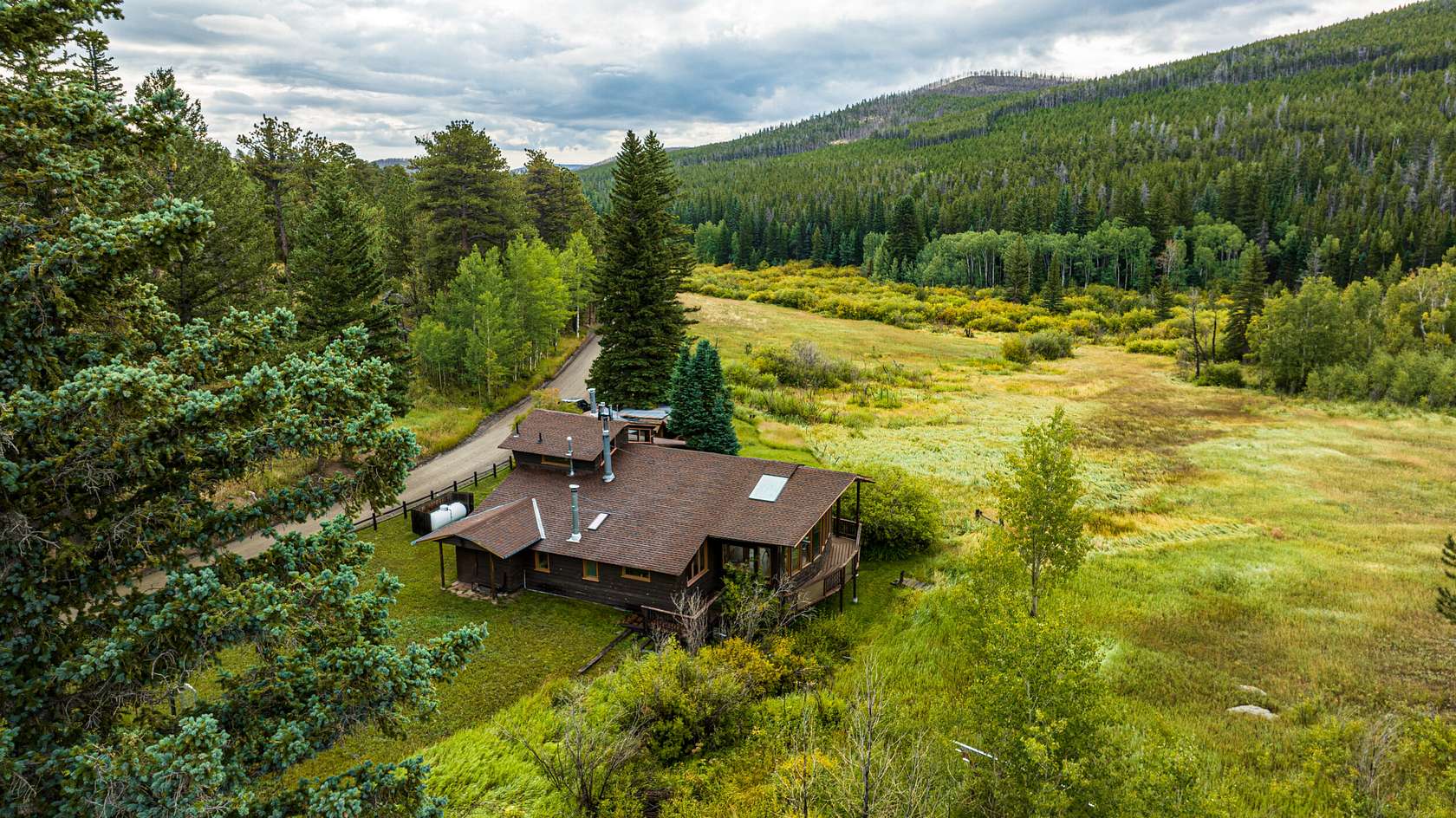 40.7 Acres of Recreational Land with Home for Sale in Bellvue, Colorado