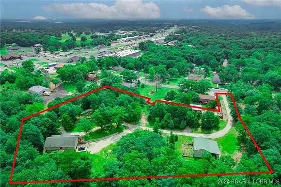 2.57 Acres of Residential Land with Home for Sale in Laurie, Missouri