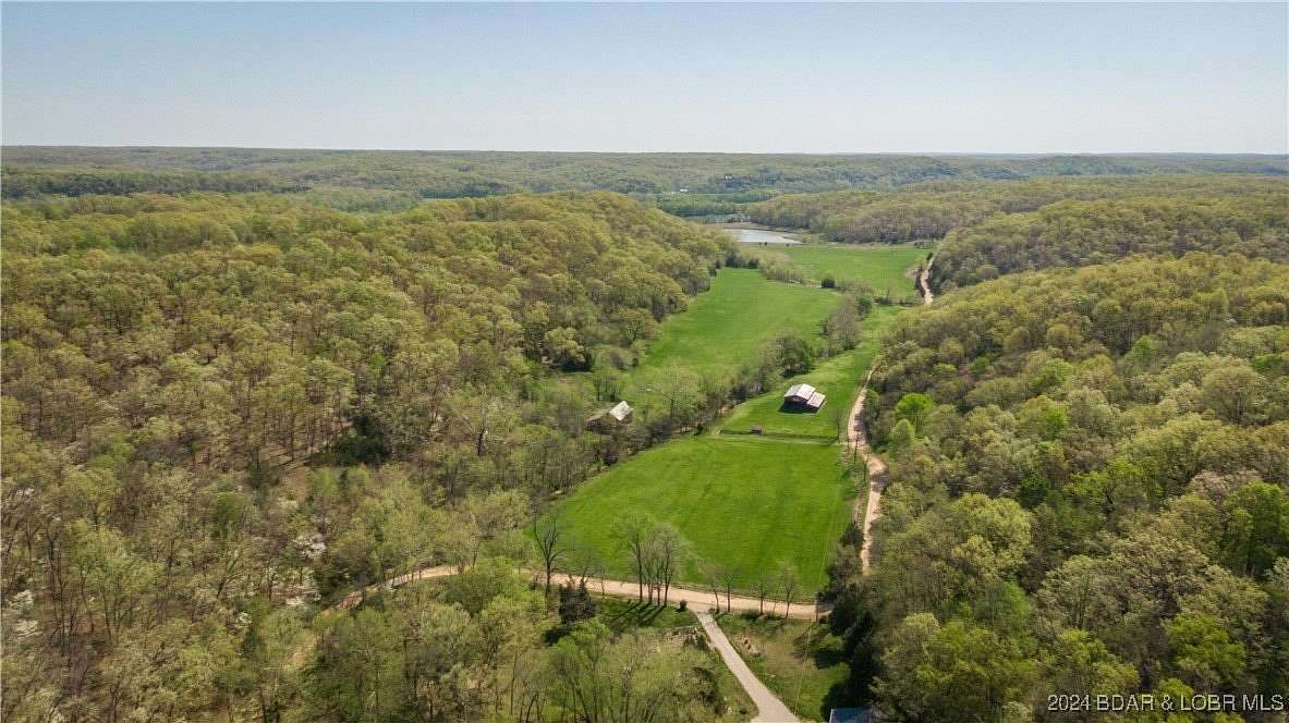 243 Acres of Recreational Land with Home for Sale in Kaiser, Missouri