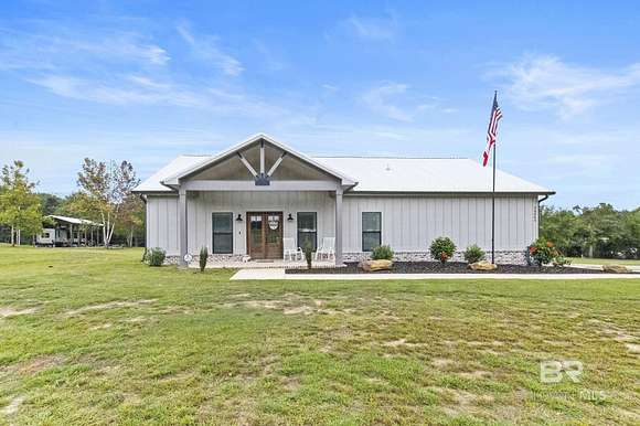 12.247 Acres of Land with Home for Sale in Robertsdale, Alabama