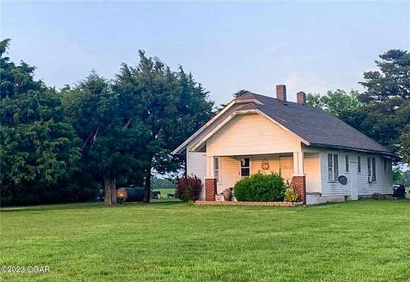 3.9 Acres of Residential Land with Home for Sale in Columbus, Kansas