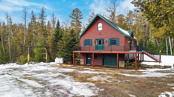 2.1 Acres of Residential Land with Home for Sale in Rangeley, Maine