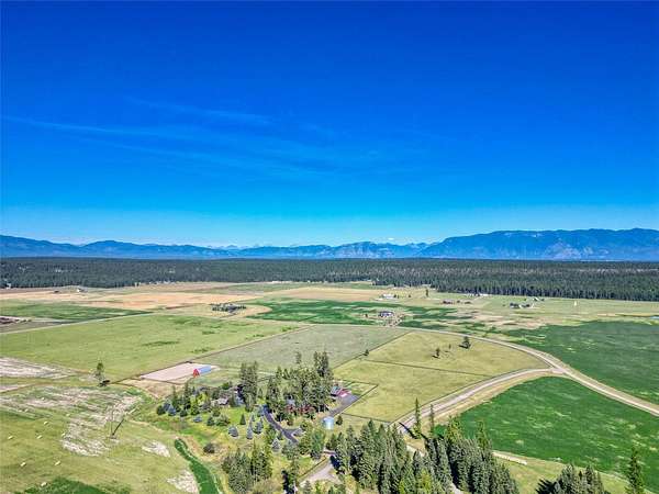 38 Acres of Agricultural Land with Home for Sale in Whitefish, Montana