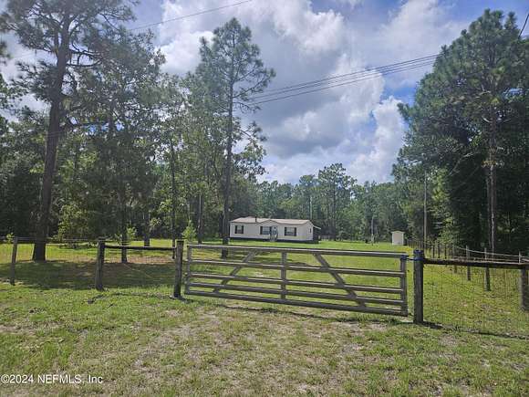 5.7 Acres of Residential Land with Home for Sale in Keystone Heights, Florida