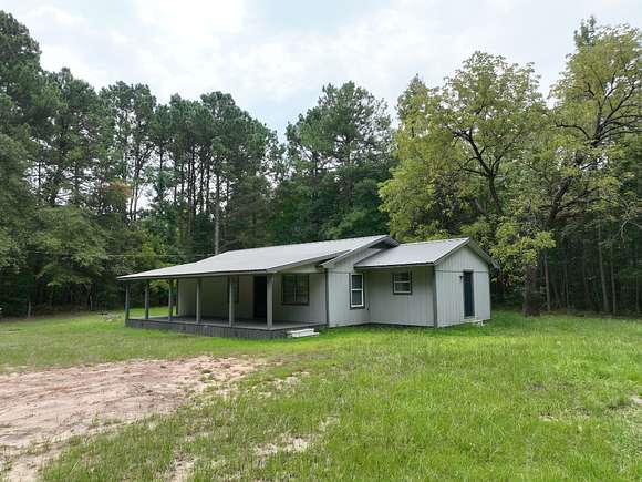 11.38 Acres of Recreational Land with Home for Sale in Bivins, Texas