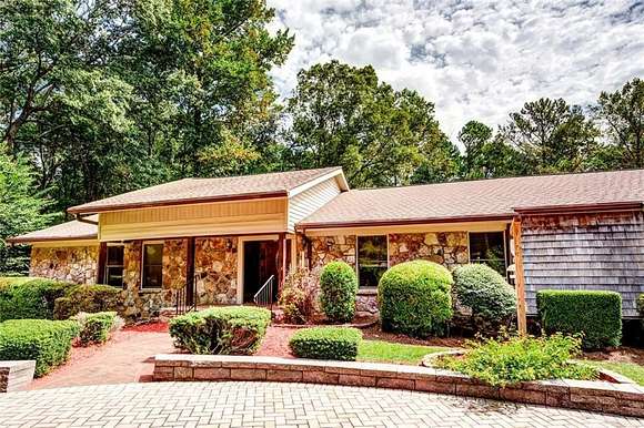 11.1 Acres of Land with Home for Sale in Conyers, Georgia