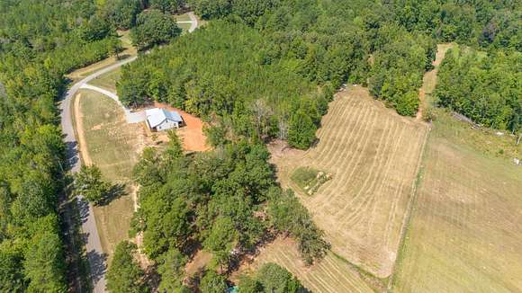 9.75 Acres of Residential Land with Home for Sale in Michie, Tennessee