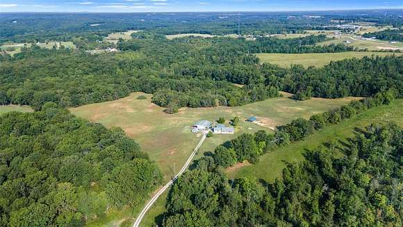 67.67 Acres of Land with Home for Sale in Marble Hill, Missouri