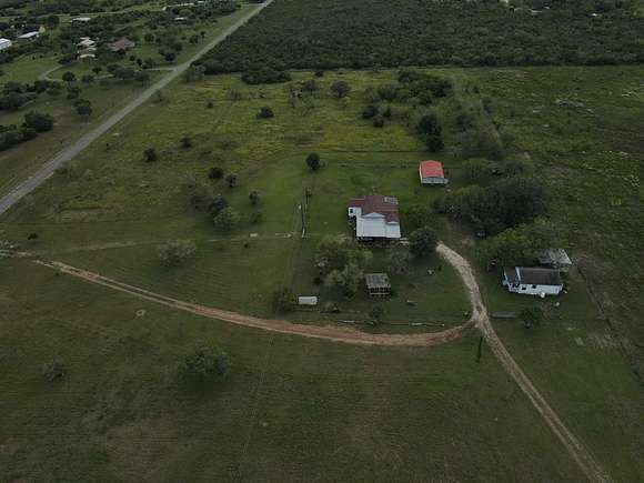 10.97 Acres of Land with Home for Sale in Beeville, Texas