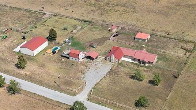 27.312 Acres of Land with Home for Sale in Big Cabin, Oklahoma