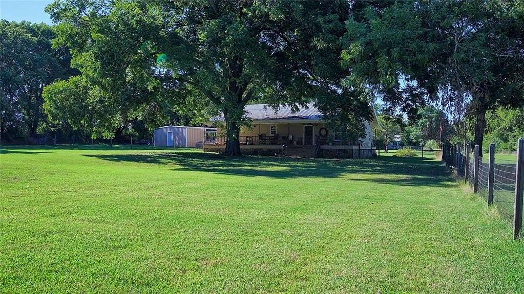 7.12 Acres of Residential Land with Home for Sale in St. Jo, Texas