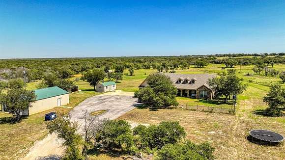 15.502 Acres of Land with Home for Sale in Santo, Texas