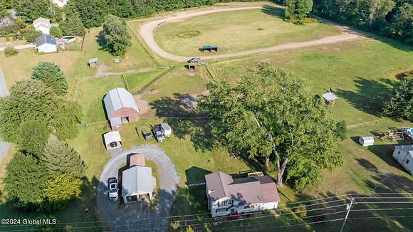 11.63 Acres of Land with Home for Sale in Moreau Town, New York