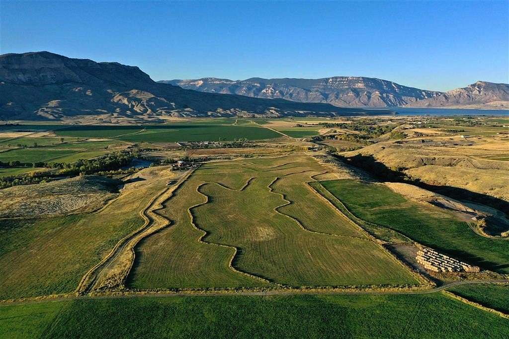 127 Acres of Land with Home for Sale in Cody, Wyoming