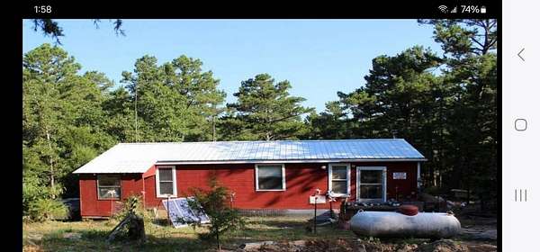 10 Acres of Land with Home for Sale in Moyers, Oklahoma