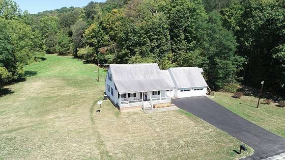 45.4 Acres of Land with Home for Auction in Waynesburg, Pennsylvania