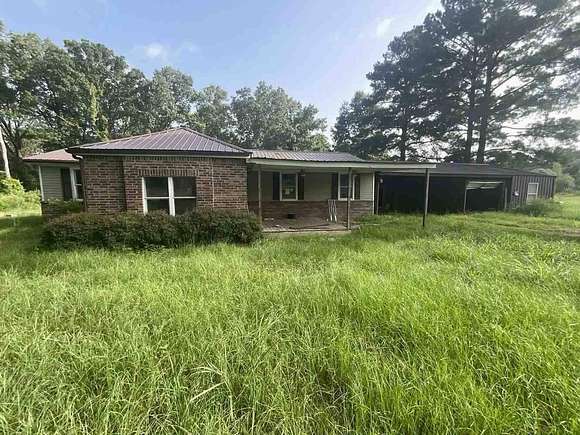 3.389 Acres of Residential Land with Home for Auction in Stonewall, Louisiana