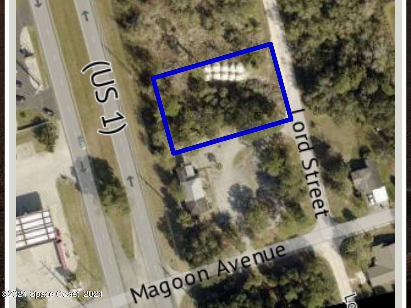 0.52 Acres of Mixed-Use Land for Sale in Mims, Florida