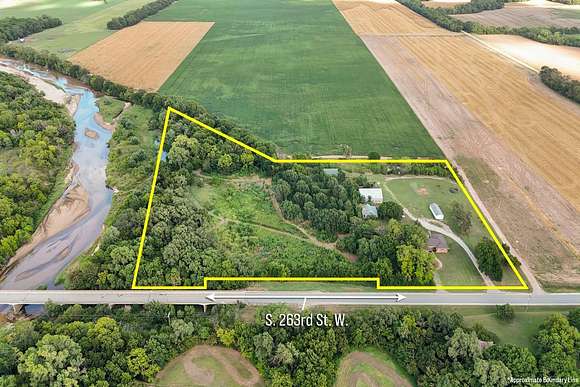 12.74 Acres of Land with Home for Auction in Viola, Kansas