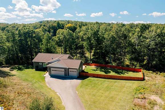 6.5 Acres of Residential Land with Home for Sale in Traverse City, Michigan