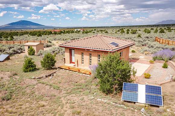 6.98 Acres of Residential Land with Home for Sale in Questa, New Mexico