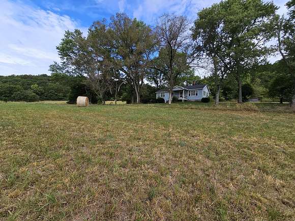 85 Acres of Land with Home for Sale in Pineville, Missouri