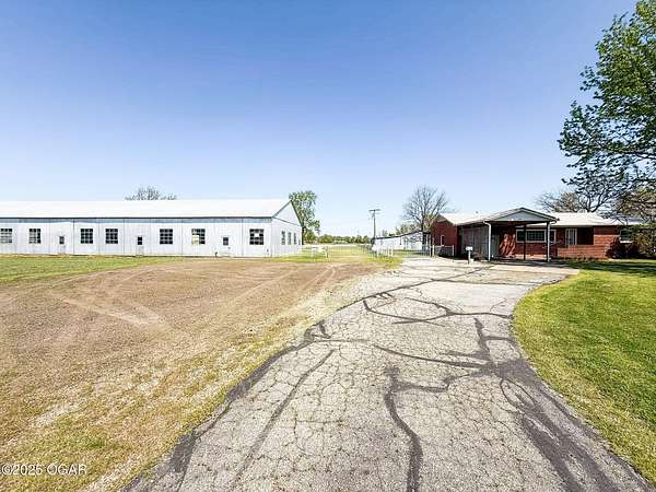 5 Acres of Land with Home for Sale in Columbus, Kansas