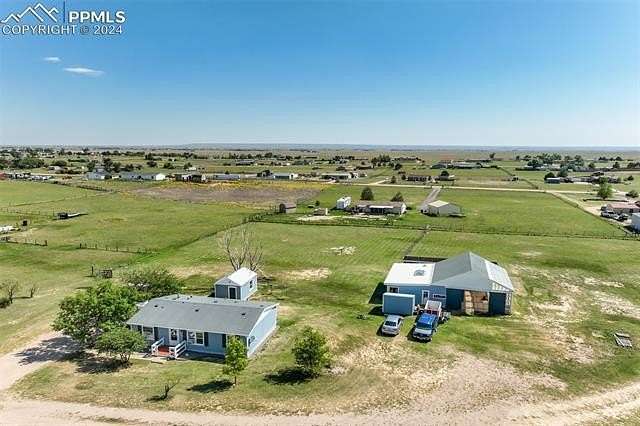 2.5 Acres of Residential Land with Home for Sale in Peyton, Colorado