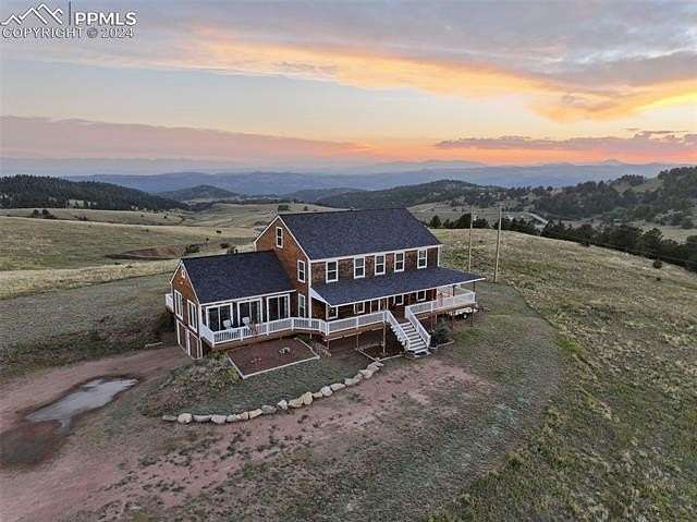 7.77 Acres of Residential Land with Home for Sale in Cripple Creek, Colorado