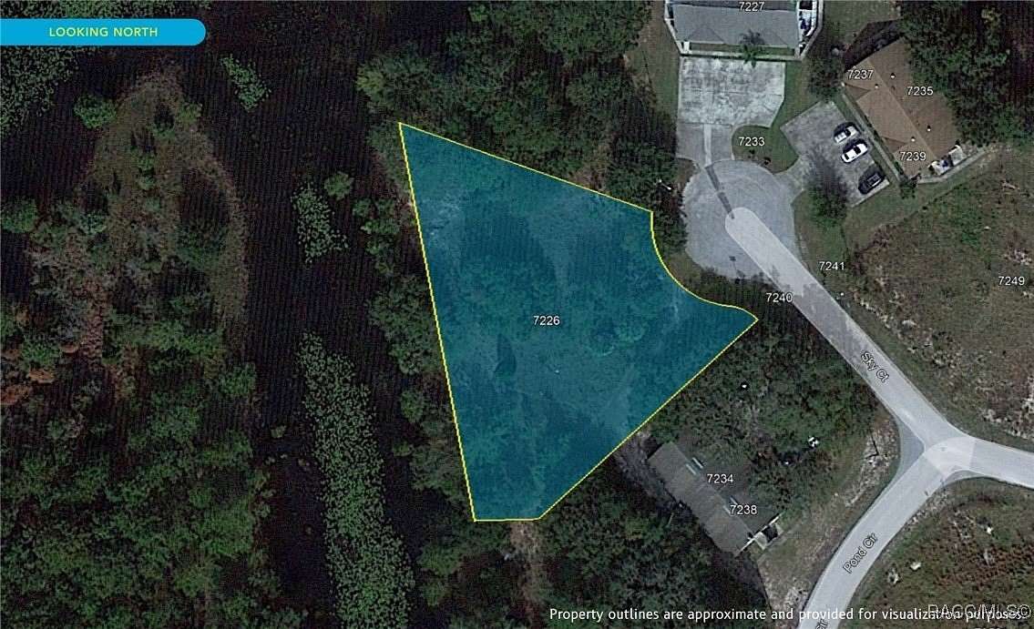 0.6 Acres of Land for Sale in Spring Hill, Florida
